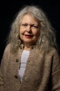 Portrait of Christine Fisher-Lathwell on black background