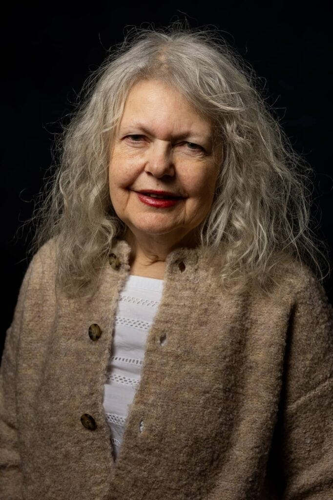 Portrait of Christine Fisher-Lathwell on black background