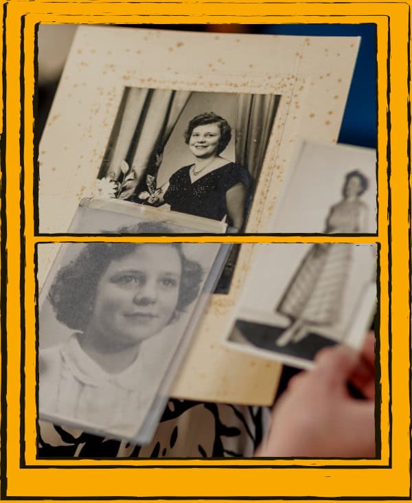 Black and white photos behind an orange window frame